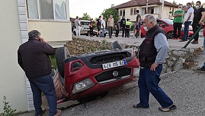 Takla atan araçtan yara almadan kurtuldu