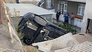 Evin bahçesine uçan otomobilin sürücüsü yaralandı