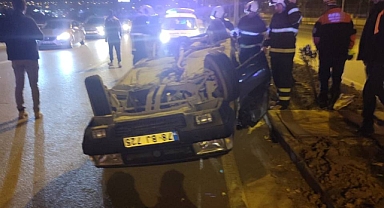 Takla atan aracın sürücüsü yara almadan kurtuldu
